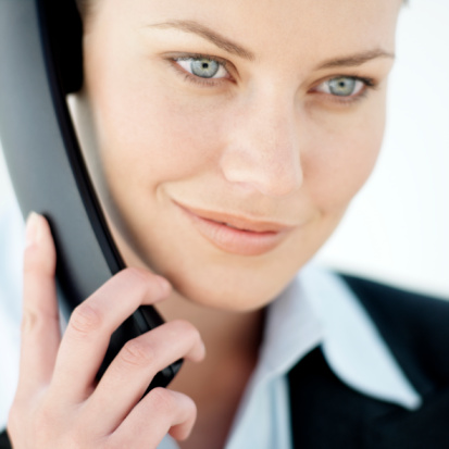 woman talking on the phone performing an SEO consultation